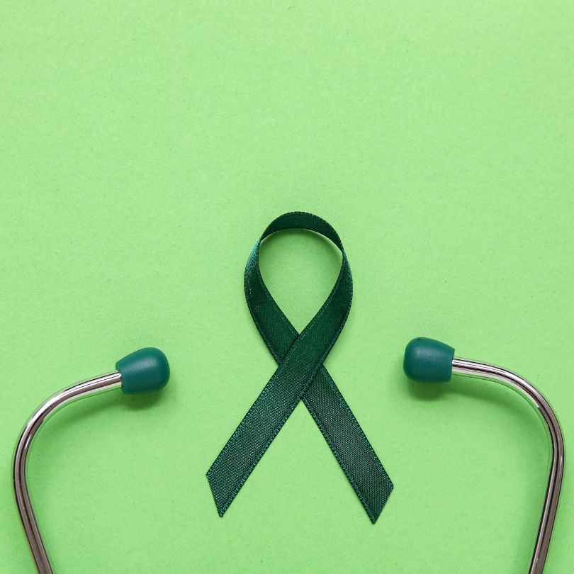 Green cerebral palsy awareness ribbon centered on a light green background, framed on both sides by 