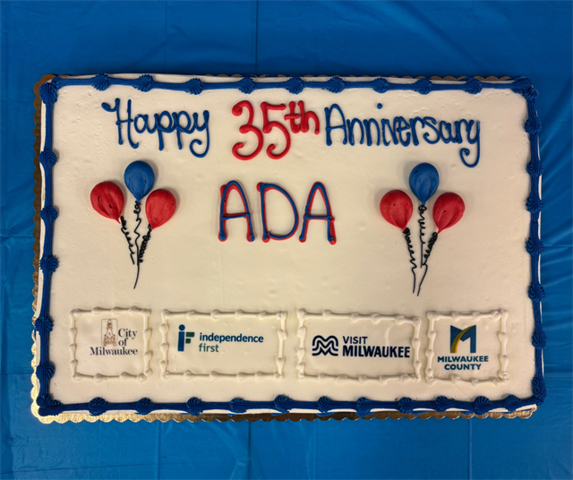 Sheet cake decorated with balloons that says Happy 35th Anniversary ADA