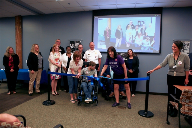 Photo of a ribbon cutting at the ADA anniversary event