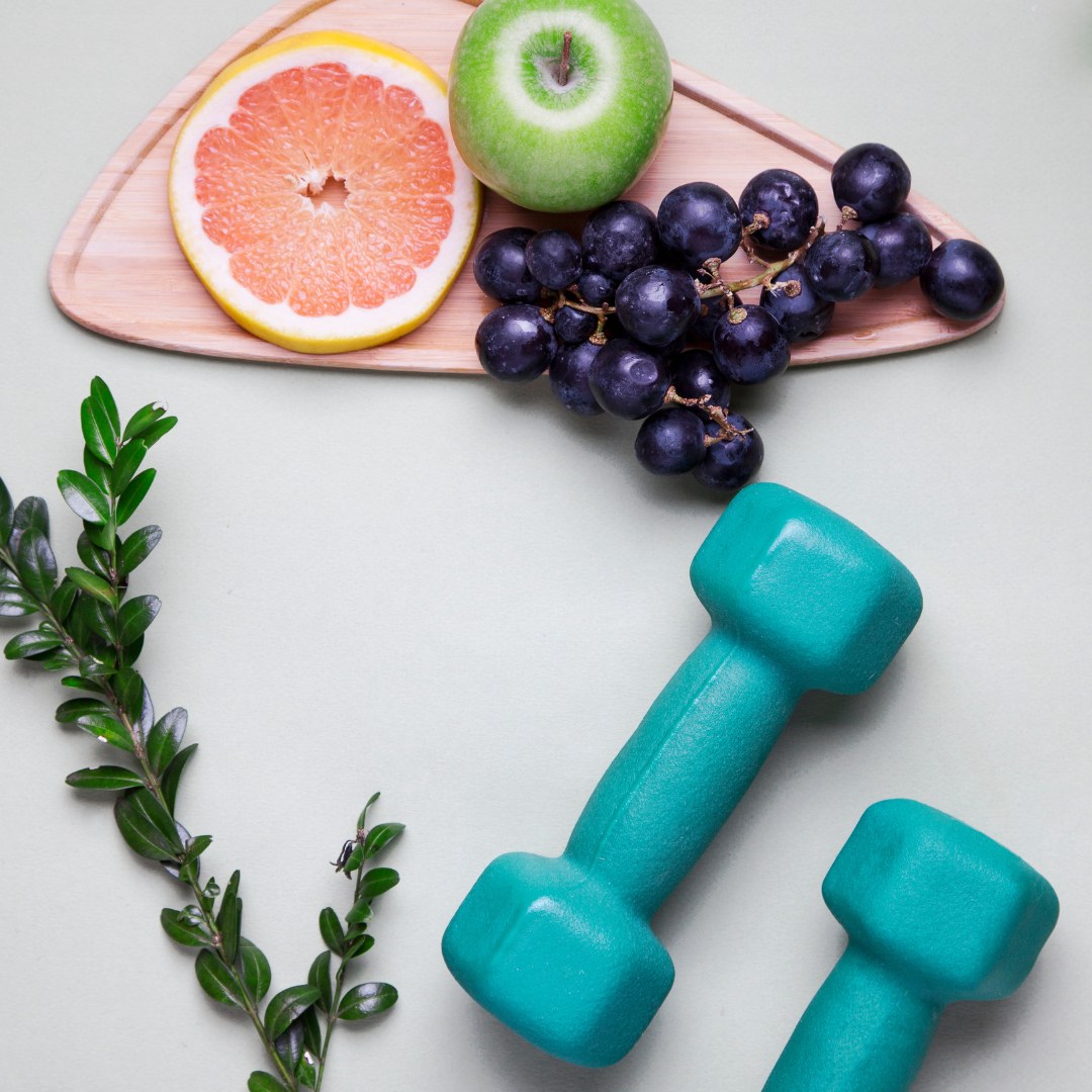 Photo of fruits, hand weights and herbs