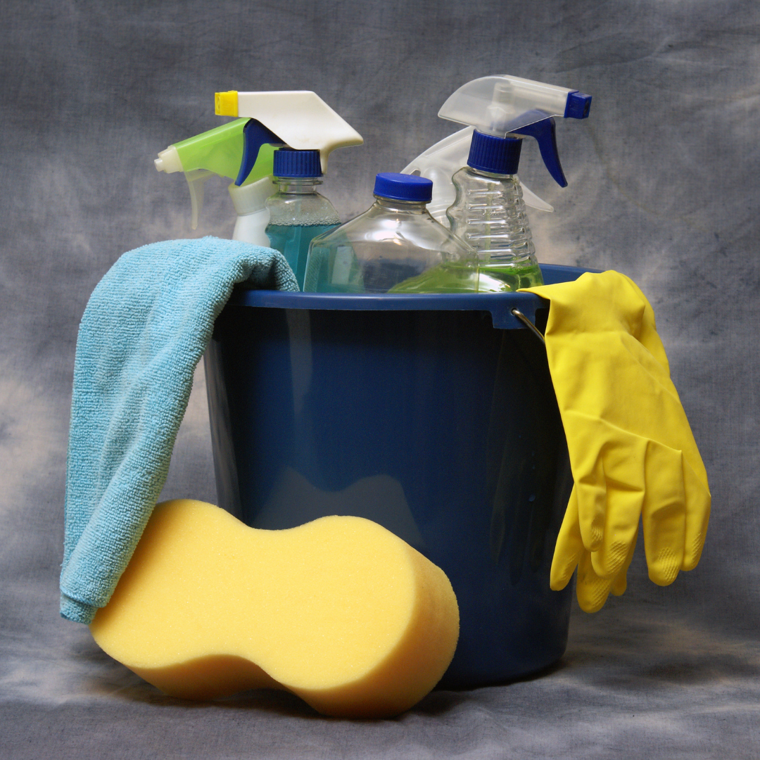 A bucket with cleaning supplies