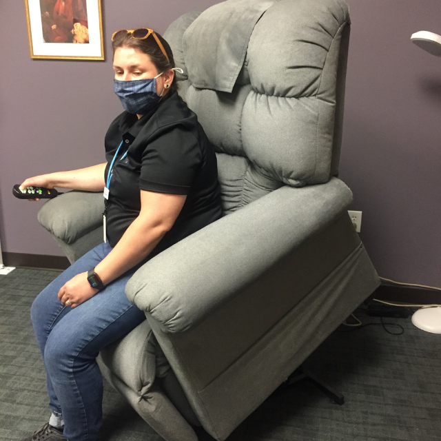 woman uses an automated chair