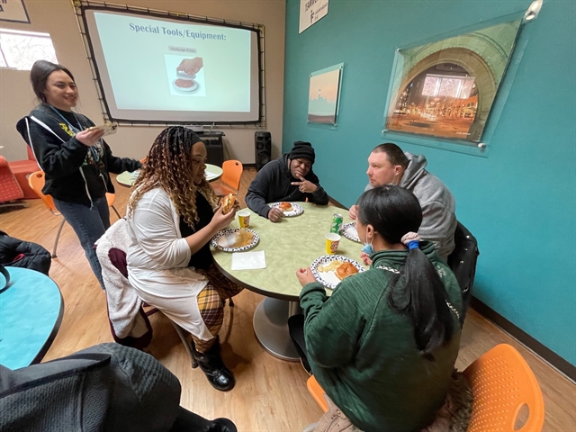 Cooking workshop group enjoy diabetic friendly burgers they made