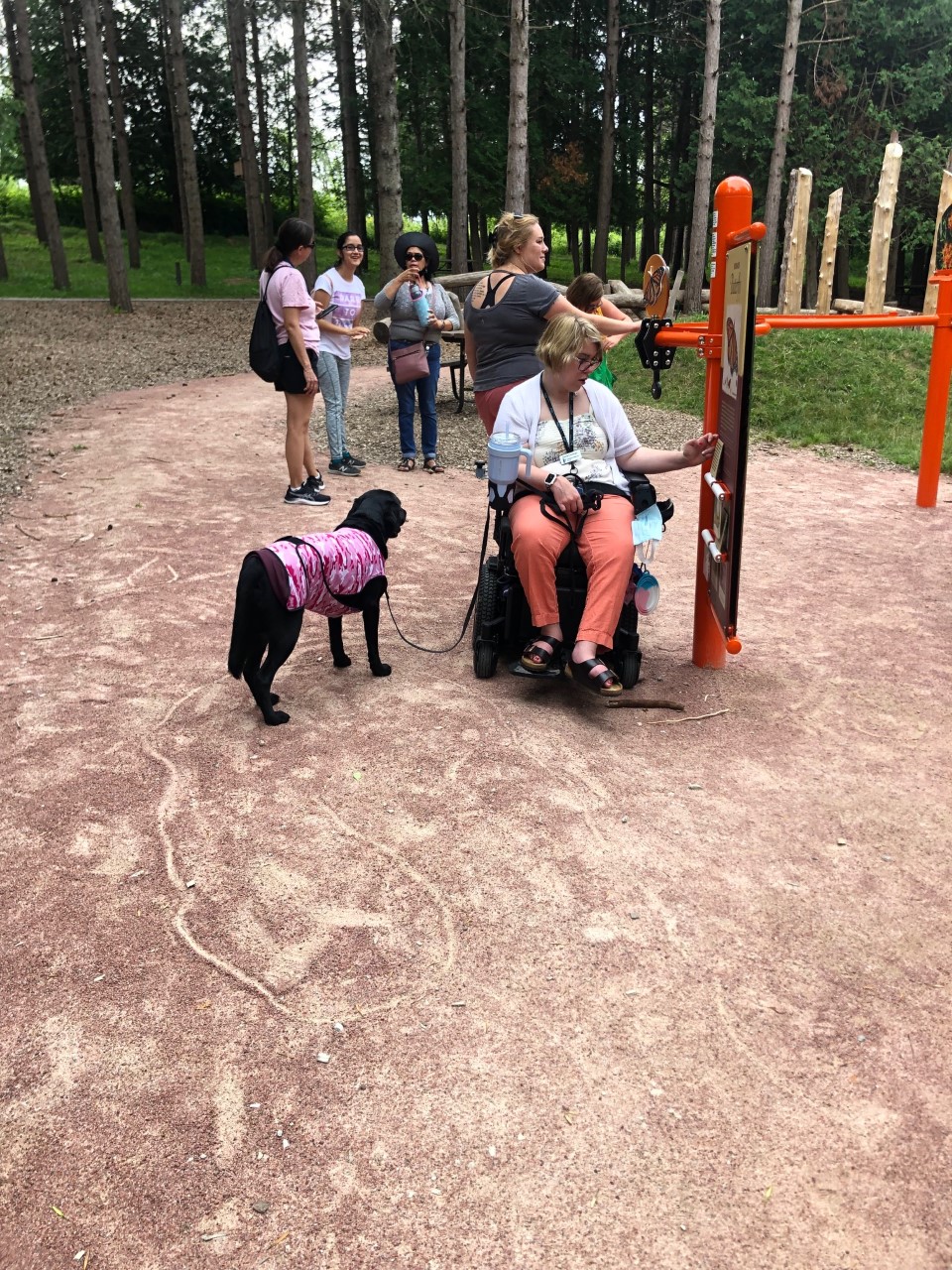 Emily and Venus her service dog enjoying the Retzer Nature Center